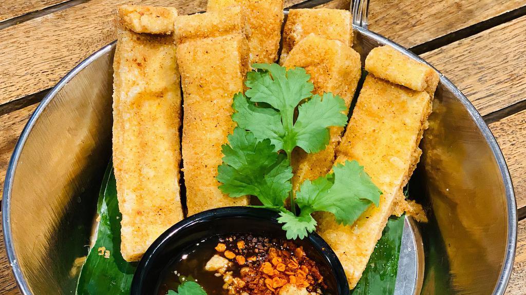 Golden Fried Tofu · Fried Tofu serve with sweet chili top ground peanut dip.