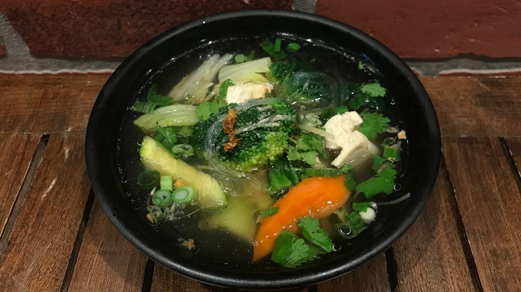 Glass Noodle Soup · Keang jued woon sen. Traditional clear Thai broth served with tofu, bean thread noodles, fried garlic, ginger & mixed vegetables.