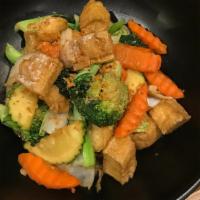 Healthy Delight · Sautéed mixed vegetables, tofu, ginger in brown sauce.