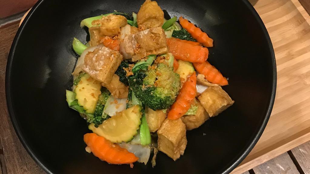 Healthy Delight · Sautéed mixed vegetables, tofu, ginger in brown sauce.