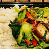 Kana Moo Kob On Rice · Medium spicy. Sautéed Chinese broccoli with crispy pork belly, long hot pepper, chili & garl...