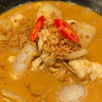 Massaman Curry · Spicy. Sweet curry paste, potato, peanut, onion & fried shallot in coconut milk