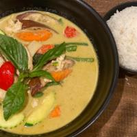 Green Curry · Spicy. Green curry paste, bamboo shoot, string bean, eggplant, basil, zucchini, carrot & bel...