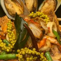 Pad Cha · Satèed mixed seafood ( Shrimp, Mussel, Bay Scallop, Tilapia & Squid) with white wine, mushr...