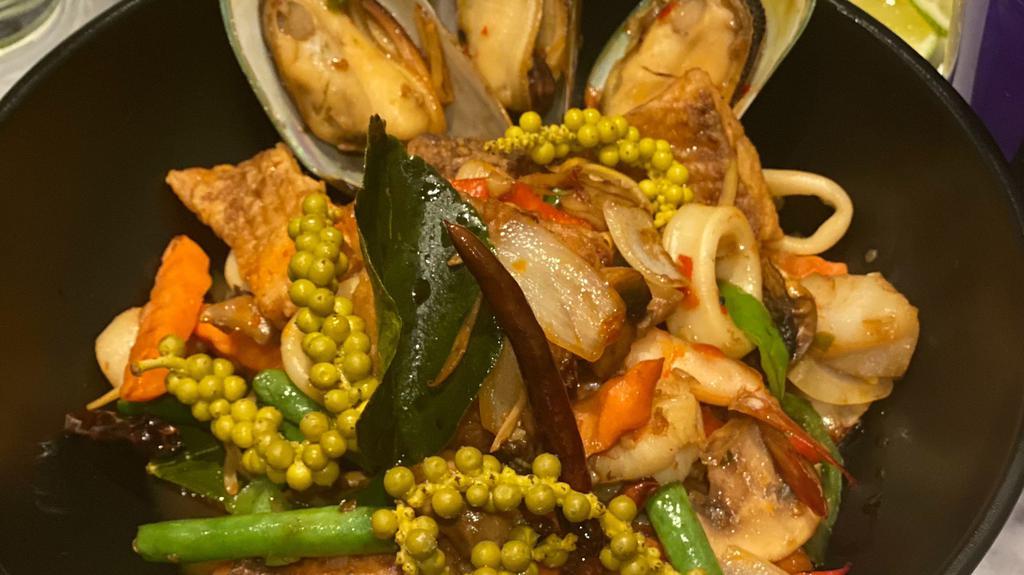 Pad Cha · Satèed mixed seafood ( Shrimp, Mussel, Bay Scallop, Tilapia & Squid) with white wine, mushroom, long hot pepper, lime leaf, carrot, onion, string bean & Thai herbs in chili basil sauces.