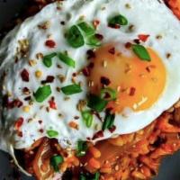 Kimchi Fried Rice · Stir-fried rice with Kimchi and choice of protein. Served with Fried Egg on top.