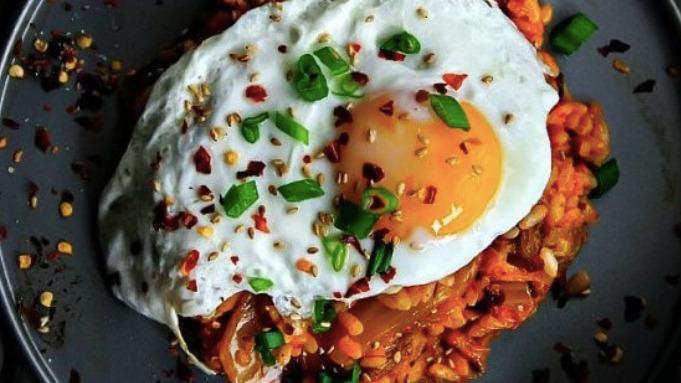 Kimchi Fried Rice · Stir-fried rice with Kimchi and choice of protein. Served with Fried Egg on top.