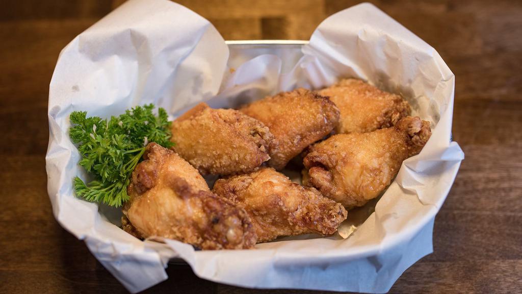 Soy Garlic Wings · Fried chicken wings marinated in soy garlic sauce.