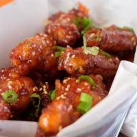 Yang Yum Wings · Fried Chicken marinated in sweet and spicy sauce.