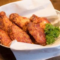 Korean Hot Wings · Fried Chicken wings marinated in Korean spicy sauce.