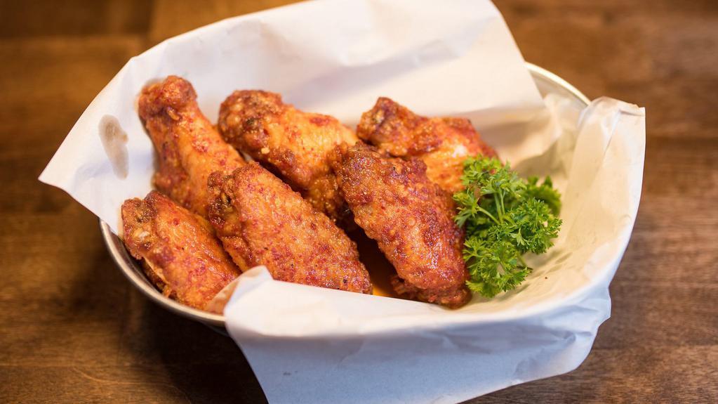 Korean Hot Wings · Fried Chicken wings marinated in Korean spicy sauce.