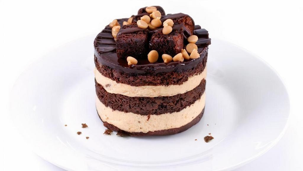 New! Chocolate Peanut Butter Drop  · A dynamite combination of fudge brownies, velvety smooth peanut butter mousse and chocolate cake is topped with brownie chunks and peanut butter chips. 710 calories.