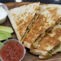 Chicken Quesadilla · Grilled chicken, onion, Greek peppers, mozzarella, and Cheddar cheese. Served with avocado, ...