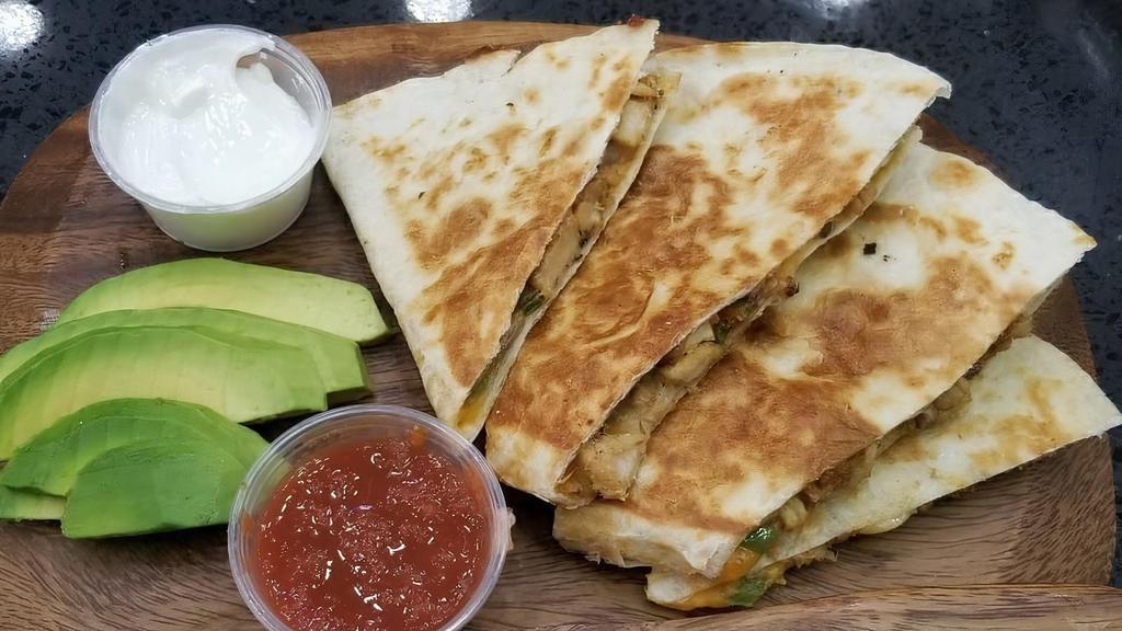 Chicken Quesadilla · Grilled chicken, onion, Greek peppers, mozzarella, and Cheddar cheese. Served with avocado, sour cream, and salsa.