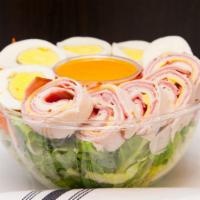 Chef Salad · Romaine, tomatoes, carrots, boiled egg, turkey breast, turkey ham, Swiss American cheese.