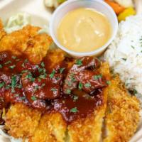 Chicken Katsu Plate · Deep fried breaded chicken cutlet, served with a tangy Japanese Tonkatsu sauce.