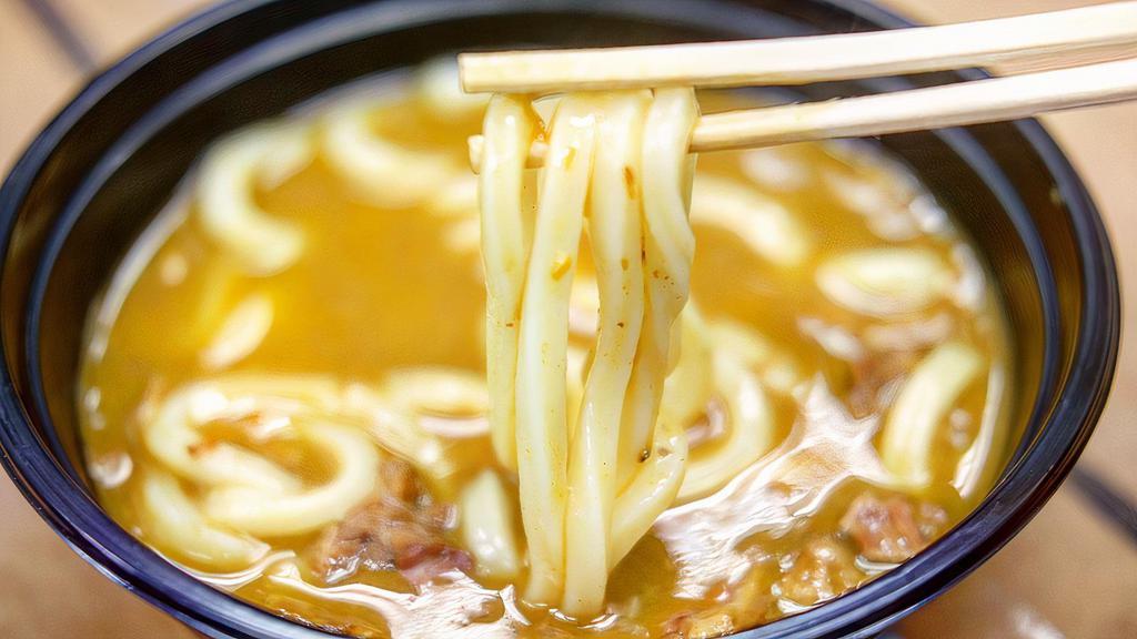 Beef Curry Udon · Thick chewy Udon noodles soaked in our savory curry sauce.