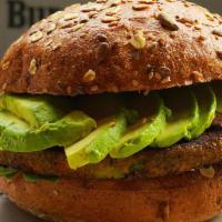 California Veggie · Vegetable burger topped with avocado, tomato and baby spinach, served on multi grain bun.