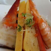 Sunomono Combination · Surf clam, shrimp, egg, octopus, crabstick salmon in ponzu sauce.