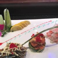 Hayashi Salad · Broiled salmon skin, Kant, seaweed and spicy tuna salads on a bed of avocado and caviar.