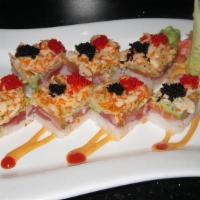 Hayashi Roll · Tuna, salmon, yellowtail, topped with spicy king crab, avocado, tobiko and special sauce.