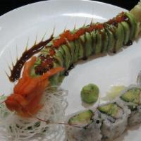 Dragon Roll · Eel, cucumber, topped with avocado and masago.