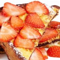 Strawberry French Toast A La Carte · Bread soaked in eggs and milk, then fried and topped with strawberries served with a side of...