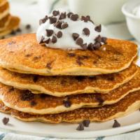 Chocolate Chip Pancakes · Served with 3 buttery pancakes cooked to perfection and topped with Chocolate chips.