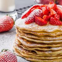 Strawberry Pancakes · Served with 3 buttery pancakes cooked to perfection and topped with fresh strawberries.