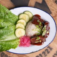 Korean Bbq Style Short Rib Lettuce Wrap · Tender braised short rib in Korean style BBQ sauce served with sushi rice, radish and pickle...