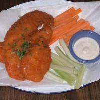 Buffalo Chicken Fingers · Buffalo Chicken tenders crispy and hot served with carrots, celery and choice of dipper