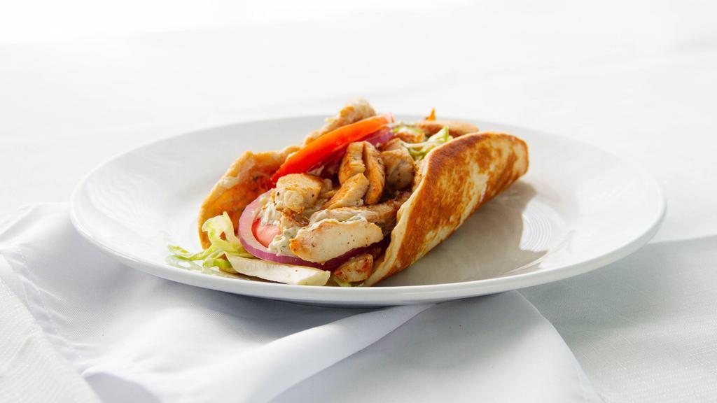 Gyro · With Gyro Meat or Grilled Chicken, Lettuce, Tomatoes, Onions & Gyro Sauce on Pita Bread.