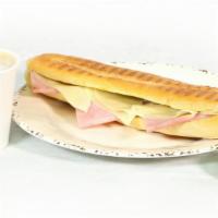 House Sandwich · Most popular 9' bread served with ham cheese house salsa and coffee.