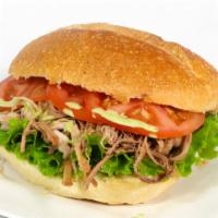 Pernil Sandwich · Roasted pork, lettuce, tomatoes and house salsa, FREE Classic coke 12 oz