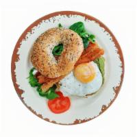 Bagel  Breakfast  · Toasted everything bagel, avocado spread, egg, bacon, spinach, tomatoes