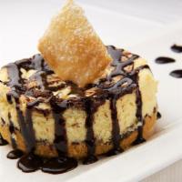 Chocolate Cheesecake · Our delicious marbled chocolate cheesecake topped with chocolate sauce