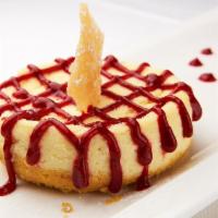 Strawberry Cheesecake · Our delicious homemade cheesecake topped with our special strawberry sauce