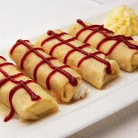 Cheese Blintzes · Wonderful thin homemade blintzes filled with a sweet creamy cheese and served with strawberr...