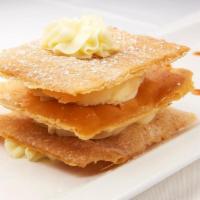 Napoleon · Pleasant vanilla cream sandwiched between three layers of special crispy sweet filo dough
