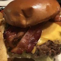 Bacon Cheeseburger · Angus beef burger topped with American cheese and bacon, lettuce, tomato and onion served wi...