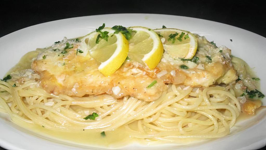 Chicken Francese Over Ziti · Hand battered chicken francese in a savory lemon wine and butter sauce served over penne pasta