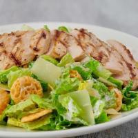 Grilled Chicken Caesar Salad · Fresh grilled chicken on a bed of romaine lettuce, tomato and onions topped with ceasar dres...