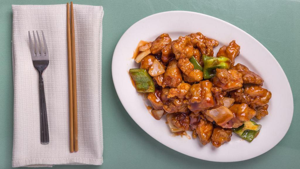Sweet And Sour Chicken(L) · Served with fried rice or white rice or pork rice or brown rice and egg roll and or brown rice and spring roll.
