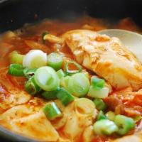 Soontofu · Mixed seafood spicy stew served with vegetable and soft tofu(with beef broth).
