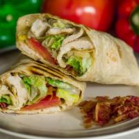 Chicken Caesar Wrap · Grilled chicken, crisp romaine, bacon, tomato, and a blend of Parmesan cheeses tossed in a c...