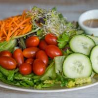 Garden Grab · Romaine lettuce, mixed greens, cucumbers, sprouts, grape tomato, black olives and shredded c...