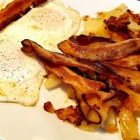 1 Egg (Any Style) · one egg any style served with home fries and toast