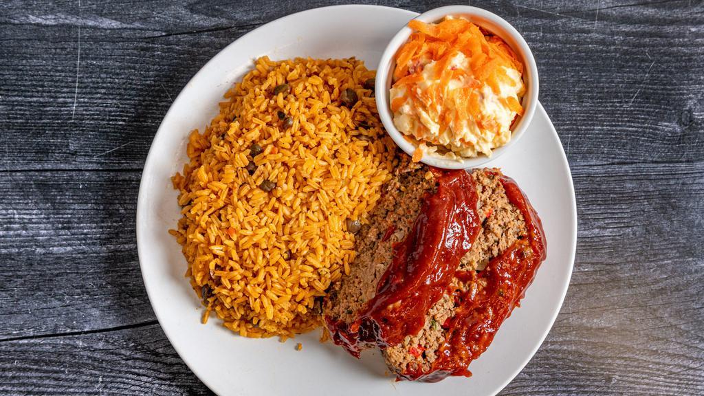 Beef Meatloaf · Beef meatloaf served with a side of rice and beans or mashed potatoes and vegetables.