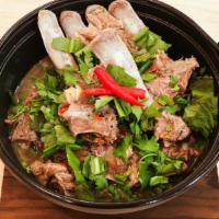 Leng Zabb · Pork back bones in spicy Thai herb broth with fresh chili, culantro and cilantro