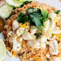 Khao Pad Poo · Jumbo lump crab meat fried rice with onion, scallion, and egg served with house special spic...